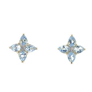 A pair of diamond and blue topaz ear studs. Each designed as a pear-shape blue topaz quatrefoil, wit