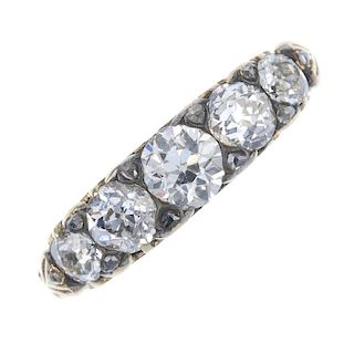 An early 20th century 18ct gold diamond five-stone ring. The graduated old-cut diamond line, with di