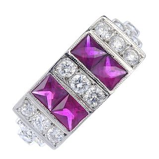 A ruby and diamond dress ring. Designed as two square-shape ruby pairs, with brilliant-cut diamond l