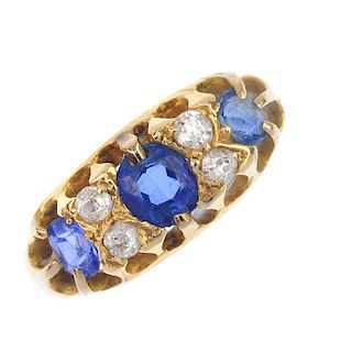 A sapphire and diamond ring. The graduated oval-shape sapphire line, with old-cut diamond double spa