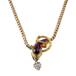 A mid Victorian snake necklace, circa 1850. The foil-back purple and red garnet snake head with diam