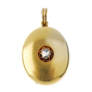 A late 19th century 18ct gold diamond locket. The front set with a rose-cut diamond, to the plain re