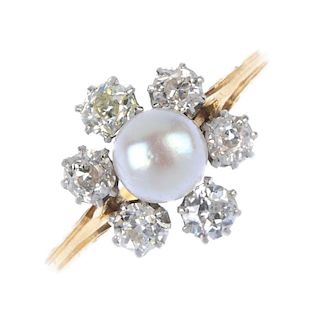 An early 20th century gold cultured pearl and diamond cluster ring. The cultured pearl, within a old