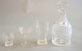 23 Piece Cut Glass Decanter Set, having four decanters along with 19 matching glasses in three sizes, decanter height 9 1/2 inches. Provenance: Waterf