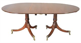 George IV Mahogany Two Part Oval Dining Table, on double pedestal base, height 29 inches, top 48" x 74", plus two 28 inch leaves, total open 48" x 130