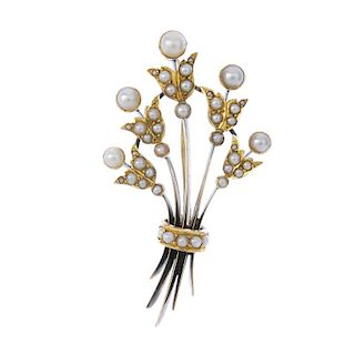 A late 19th century gold split pearl floral brooch. The graduated split pearl floral spray, with kni