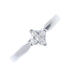 A platinum diamond single-stone ring. The square-shape diamond, weighing 0.59ct, to the plain band.