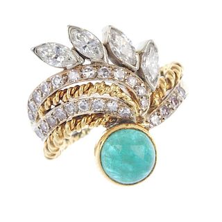 An emerald and diamond dress ring. The circular emerald cabochon, to the alternating single-cut diam