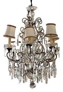 Crystal and Brass Six Light Chandelier, approximate height 31 inches, diameter 20 inches.
