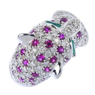 A diamond, ruby and emerald leopard ring. The pave-set diamond and ruby leopard mask with marquise-s