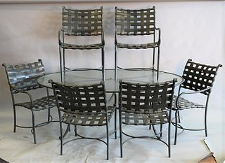 Nine Piece Brown and Jordan Outdoor Patio Set, to include an oval glass top table, six armchairs, chaise lounge, along with glass top side table, tabl