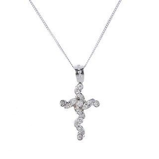 A diamond cross pendant. The brilliant-cut diamond curved lines, with similarly-cut diamond collet d