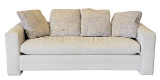 Avery Boardman Custom Queen Size Sleeper Sofa, in beige upholstery along with four throw pillows, length 87 inches, depth 35 inches.