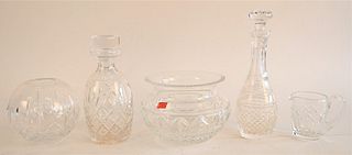 Five Piece Waterford Lot, to include two decanters, a small cream, a round vase, along with a bowl, decanter height 11 inches. Provenance: Waterfront 