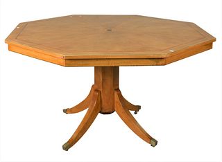 Octagonal Fruitwood Dining Table, on pedestal base having inlay and brass edge trim, height 30 inches, diameter 54 inches.