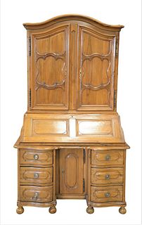 Continental Desk in Three Parts, having carved raised panels set on ball feet, height 88 inches, width 50 inches, depth 24 inches.