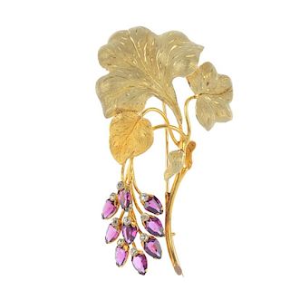 A mid 19th century diamond and garnet foliate brooch. Designed as a series of scrolling leaves, susp