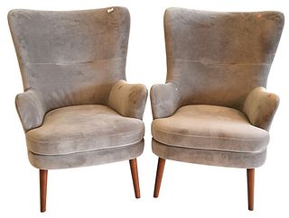 Pair of Contemporary Barrel Back Upholstered Wing Chairs, seat height 18 1/2 inches.