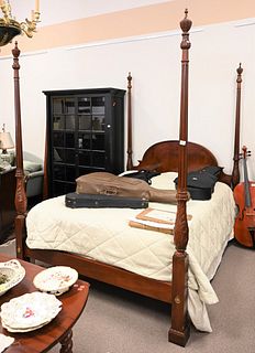 Baker Mahogany Four Post Queen Size Bed, having carved posts, height 88 inches, width 66 inches.