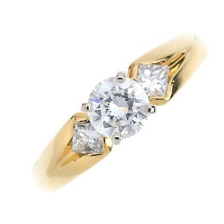 A diamond single-stone ring. The brilliant-cut diamond, to the square-shape diamond shoulders and ta