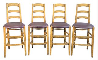 Minton Spidell Set of Four Bar Stools, having leather seats, seat height 28 inches, height 46 inches.