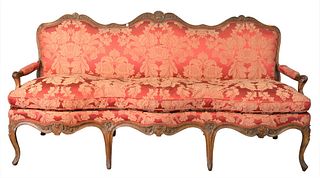 Louis XV 18th Century Restored Sofa, having open arms and custom upholstery with serpentine front, one tear in back upholstery, height 36 inches, leng