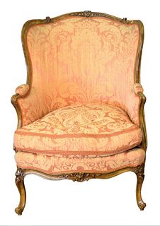 Louis XV Style Bergere, having barrel back and custom upholstery, height 40 1/2 inches, width 28 inches.