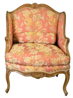 Louis XV Style Bergere, having custom upholstery and bolster pillow, height 40 inches, width 31 inches.