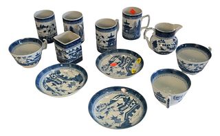 Twelve Piece Mottahedeh Blue Canton China, to include seven cups in two sizes, three saucer, and a creamer, tallest cup height 4 1/2 inches.