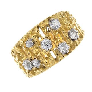 A 1960s 18ct gold diamond dress ring. Of openwork design, The scattered old-cut diamonds, to the tex