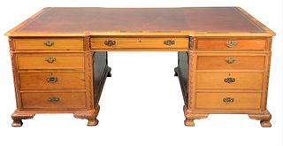 Chippendale Style Mahogany Partners Desk, having red leather top, one side with drawers, one side with drawers and doors, height 29 inches, top 46" x 