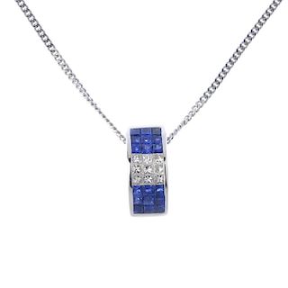 An 18ct gold sapphire and diamond pendant. Designed as a tapered hoop, the two square shape sapphire