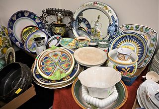 Large Group Lot of Italian and Italian Style Majolica Pottery, to include an oval wall mirror, a table lamp, several decorative platters, bowls, pitch
