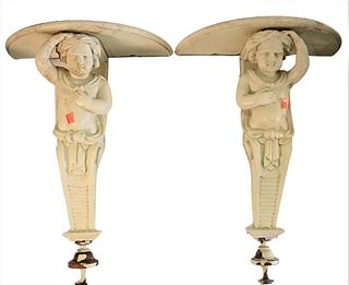 Pair of Carved Wood Bracket Shelves, having figural putti supports and white paint, height 21 1/2 inches. Provenance: Waterfront Estate, Stamford, CT.