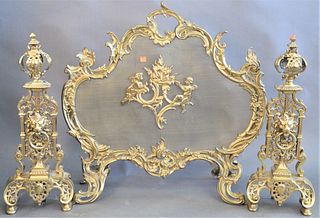 Three Piece Louis XV Style Fireplace Set, to include a screen with two mounted puttis along with a pair of andirons having mounted heads, height 28 in