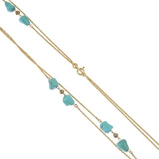 A turquoise necklace. Designed as a long fancy-link chain, with irregular-shape turquoise  and canne