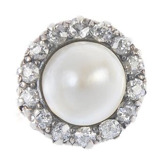 A mid 20th century gold cultured pearl and diamond cluster ring. The cultured bouton pearl, within a