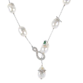 A diamond and baroque pearl necklace. Designed as a series of baroque pearls, some of which have gem