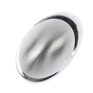 BULGARI -  a 'Cabochon' ring. Of bombe design, the textured and polished highlight tapered band. Sig