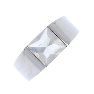 CARTIER - an 18ct gold moonstone band ring. The square moonstone cabochon, to the tapered band. Sign
