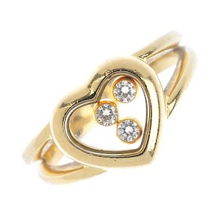 CHOPARD - an 18ct gold 'Happy Diamonds' ring. The three free-moving brilliant-cut diamond collets, w