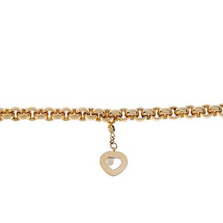 CHOPARD - a 'Happy Diamonds' pendant bracelet. The belcher-link chain, suspending a heart-shape drop