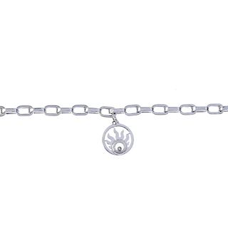 CHOPARD - an 18ct gold 'Happy Sun' charm bracelet. The belcher-link bracelet, suspending a circular-