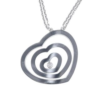 CHOPARD - a 'Happy spirit' diamond pendant. Of heart-shape design the free moving brilliant-cut diam