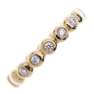 PANDORA - a 14ct gold diamond ring. Designed as a series of beads, with five brilliant-cut diamond h