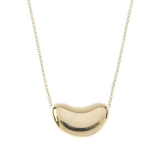 TIFFANY & CO. - a 'Bean' pendant, by Elsa Peretti for Tiffany & Co. The trace-link chain suspending
