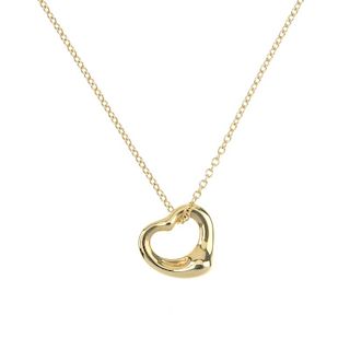 TIFFANY & CO. - an 'Open Heart' pendant, by Elsa Peretti, for Tiffany & Co. The open heart pendant,