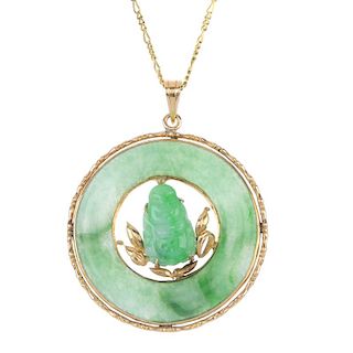 A jade pendant. Designed as a carved jadeite stylised figure, within a jadeite bi surround to the ba