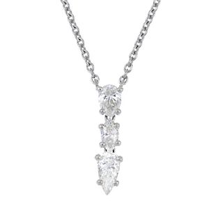 A diamond three-stone necklace. Designed as a pear and marquise-shape diamond drop, suspended from a