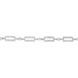 A diamond and cultured pearl bracelet. Designed as a series of rectangular-shape old-cut diamond lin